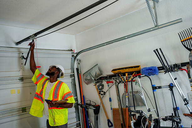 Professional Garage Door Installation technician working in Sharpes, FL